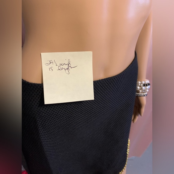 This retro miniskirt with gold chain hem detail~totally fashion forward style - Picture 10 of 12